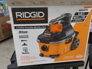 Rigid 5 HP 4 Gallon WetDry Vac po...