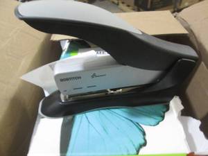 box of paper with a big stapler ...