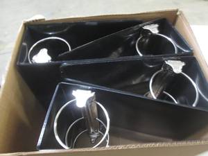 4 big black 3 ring binders...