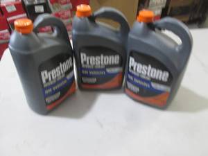 3-1 gallon jugs of prestone dex coo...