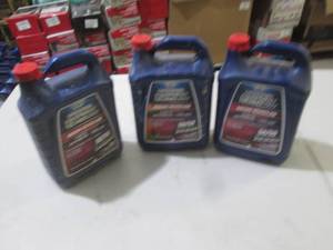 3-1 gallon jugs of redpink antifre...