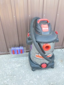 Shop Vac stainless vacuum. Used condition. Tested & works. As shown.