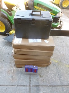 Qty of 5 chainsaw cases to be assembled. Display model not included. May be missing a few pieces. As shown.