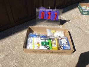 Flat of misc golf items. As shown.