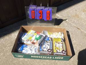 Flat of misc golf items. As shown.