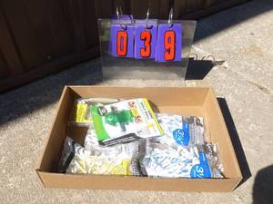 Flat of misc golf items. As shown.