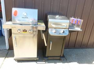 Qty of 2 stainless charbroil grills. One new & missing a few bolts. One used for parts or repair. As shown.