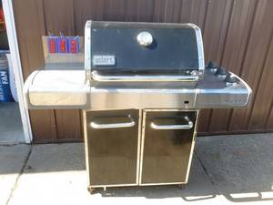 Weber gas grill. Appears to be set up for natural gas. Used. As shown.