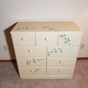 lot 125 image: Charming Nine Drawer Dresser