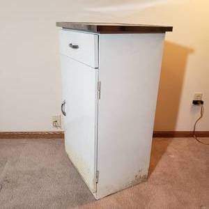 lot 130 image: Atomic Aluminum Kitchen Cabinet