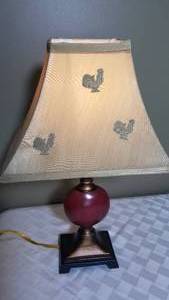 lot 185 image: Burgundy Canonball Lamp with Rooster Shade