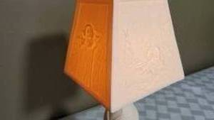 lot 157 image: Bisque Petite Nightlight Lamp with Childrens Images