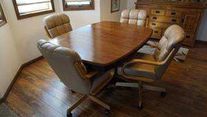 lot 14 image: Brown Dining Room Table with 4 Tan Chairs