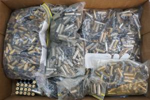 lot 27 image: Hand gun casings