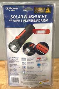 lot 102 image: Solar Flashlight with AMFM and Weatherband Radio