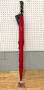 lot 99 image: Milwaukee Tool Large Golf Umbrella  10 Pack Golf Tees