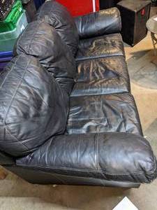 lot 28 image: Ashley Furniture Black Leather Couch