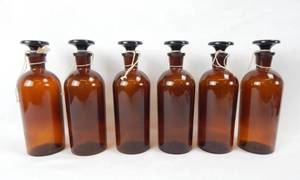 lot 17 image: Set of 6 Vintage Mercer Glass Works 16 OZ Amber Glass Bottles With Mushroom Stoppers