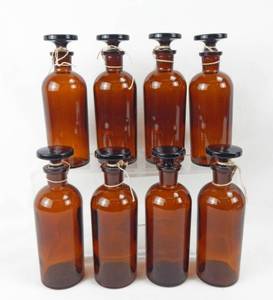 lot 19 image: Set of 8 Vintage Mercer Glass Works 8 OZ Amber Glass Bottles With Mushroom Stoppers