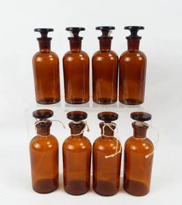 lot 27 image: Set of 8 Vintage Mercer Glass Works 125 ML Narrow Mouth Amber Glass Bottles With Mushroom Stoppers