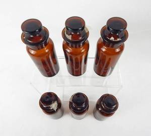 lot 43 image: Set of 6 Vintage Mercer Glass Works 4 OZ Wide Mouth Amber Glass Bottles With Mushroom Stoppers