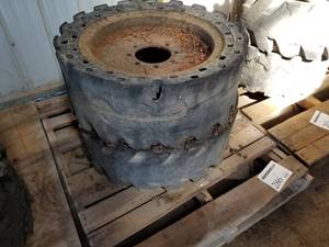lot 286 image: Lot of (2) Solid Rubber Industrial Tire 33X12- On 8-Bolt Steel Rim (on pallet)