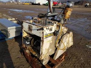 lot 309 image: Cushion Cut Concrete Saw 26  with Wisconsin 4 Cylinder Gas Engine (on pallet)