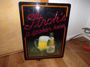 Lighted Strohs sign