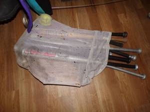 9 bats, balls and gloves