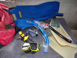Red Bag w Wetsuit, Dive Knife, snorkels, Fins, and Goggles