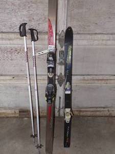 2 Pairs of Skies and 1 Set of Poles