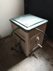 lot 94 image: Suncast Hose Storage Bin