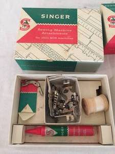 lot 217 image: Vintage Singer Sewing Machine Parts in Original Box