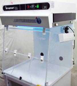 lot 36 image: MSRP $10,000 Erlab Captair Biocap RNADNA PCR Tabletop Workstation Fume Hood With UV Lamp On Rolling Cart - Great Working Condition Some Areas Of Plexiglass Panels Have Cracks