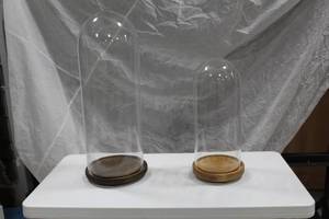 lot 21 image: Lot of (2) Restoration Hardware Clear Glass Cloche with Wood Base (in box)
