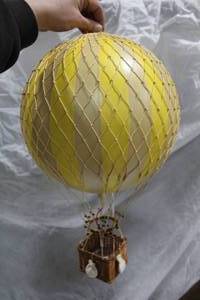 lot 125 image: Authentic Models Royal Aero Hot Air Balloon Basket Dcor Yellow (in box)