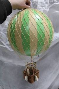 lot 127 image: Authentic Models Royal Aero Hot Air Balloon Basket Dcor Green (in box)