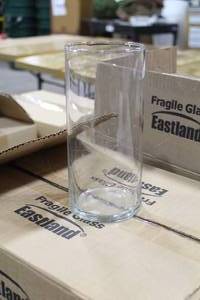 lot 140 image: Lot of (16) Eastland Clear Glass Cylinder Vase  7-12H (in box)