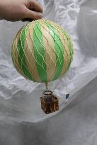 lot 29 image: Authentic Models Travels Light Hot Air Balloon Basket Dcor Green (in box)