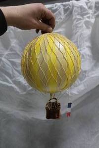 lot 131 image: Authentic Models Travels Light Hot Air Balloon Basket Dcor Yellow (in box)