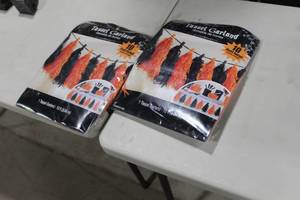 lot 350 image: Tassle Garland Orange,Black 10L (in package)
