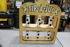 lot 348 image: Tip-A-Jug Game 28Wx10Dx32H