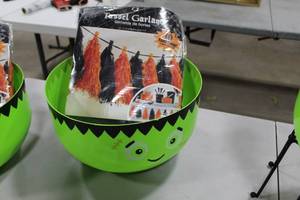 lot 384 image: Lot of (3) Dcor - Halloween Candy Bowl Lime Green, Tassle Garland OrangeBlack (x2 in package)