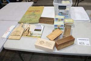 lot 421 image: Lot of Land O Lakes Collectibles - Wood Boxes, Tins, Sack, Book, Cutting Board