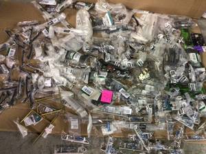 Lot of assorted cabinet door knobs and pulls not used see pictures