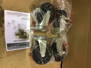 lot 32 image: Ready-to-Assemble 5 in. Black PP Caster Kit by Husky Customer Returns See Pictures 