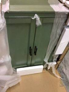 lot 50 image: Hazelton 25 in. W x 28 in. H x 8 in. D Bathroom Storage Wall Cabinet in Antique Green Customer Returns See Pictures 