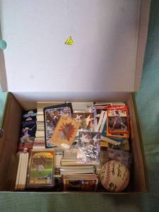 lot 21 image: Box of Baseball Cards and Replica Twins Baseball
