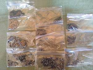 lot 64 image: 11 Bags of Hematite-like Beads