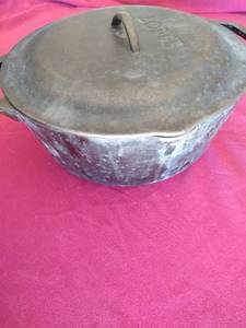 lot 99 image: Lodge Cast Iron Dutch Oven